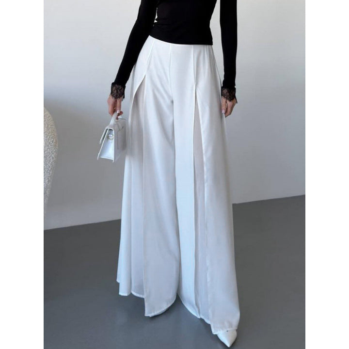 Damer Elegant långbyxa med sidorslitsar och flödande snitt Mirla-Eva Jonsson