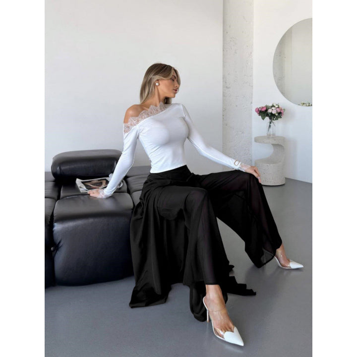 Damer Elegant långbyxa med sidorslitsar och flödande snitt Mirla-Eva Jonsson