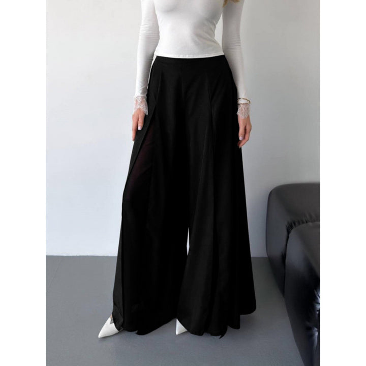 Damer Elegant långbyxa med sidorslitsar och flödande snitt Mirla-Eva Jonsson