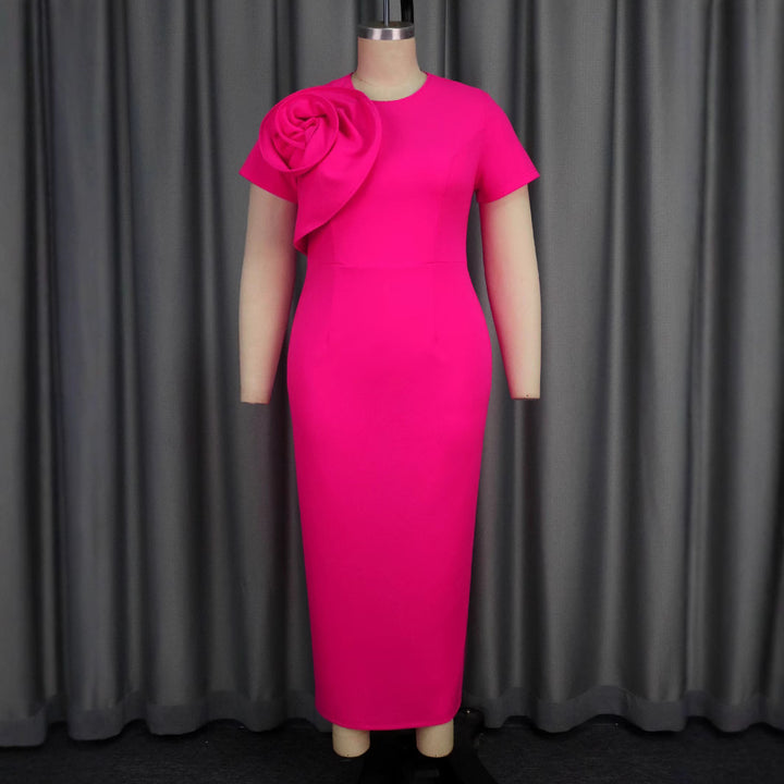 Damer Elegant maxiklänning med blommig volangdetalj Mirla-Eva Jonsson