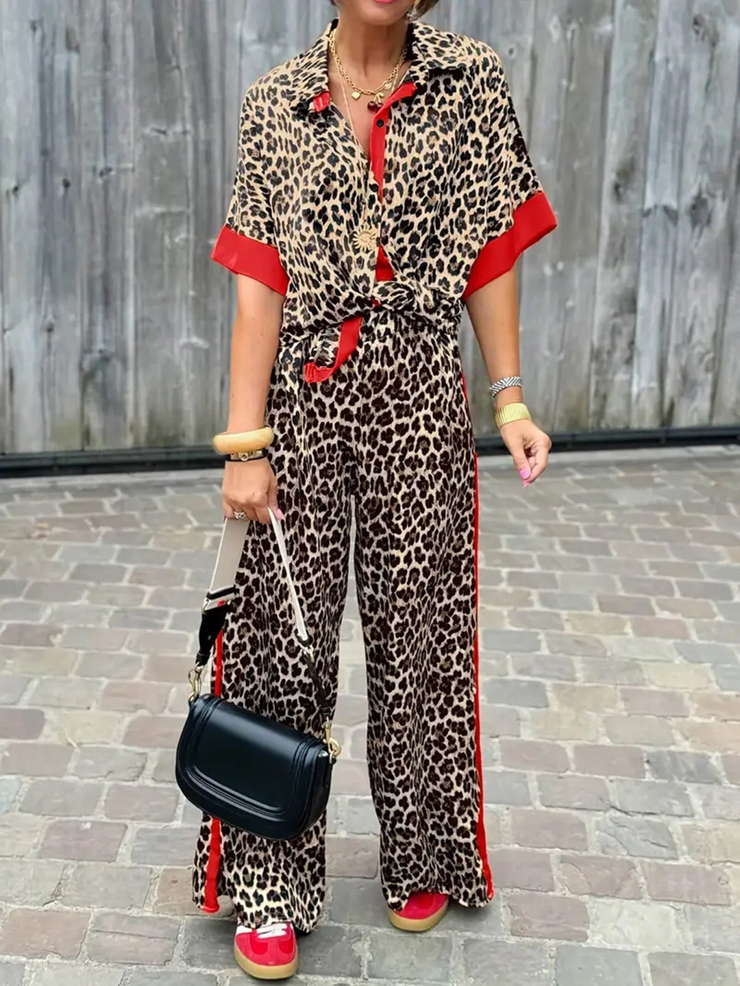 Damer Elegant och Bekväm Linne-Jumpsuit med Leopardsmönster och Kontraststreck Mirla-Eva Jonsson