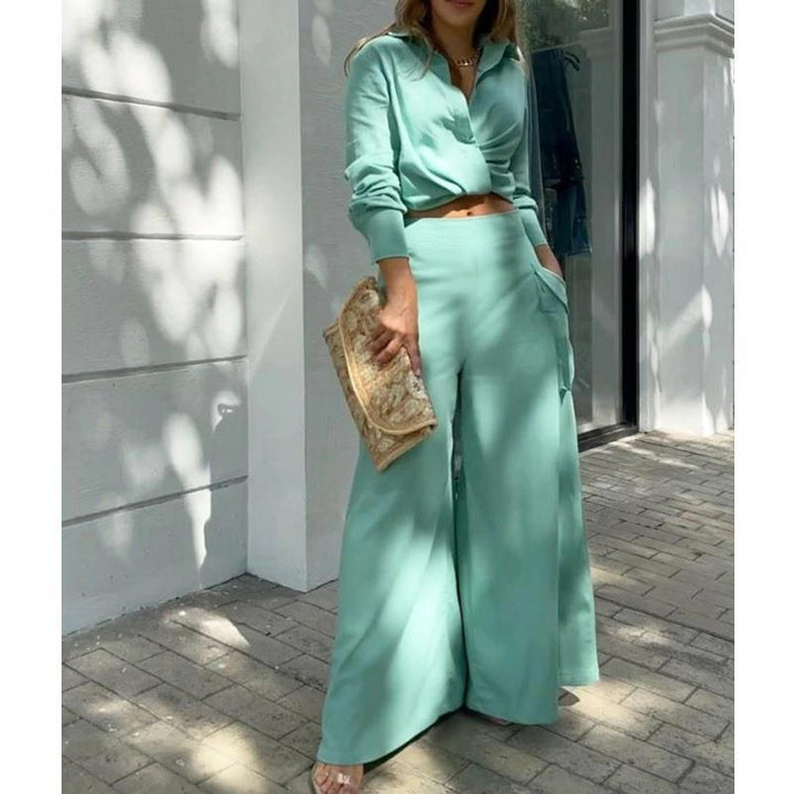Damer Elegant och avslappnad tvådelad set med crop-top och breda palazzo-byxor Eva Jonsson-Eva Jonsson