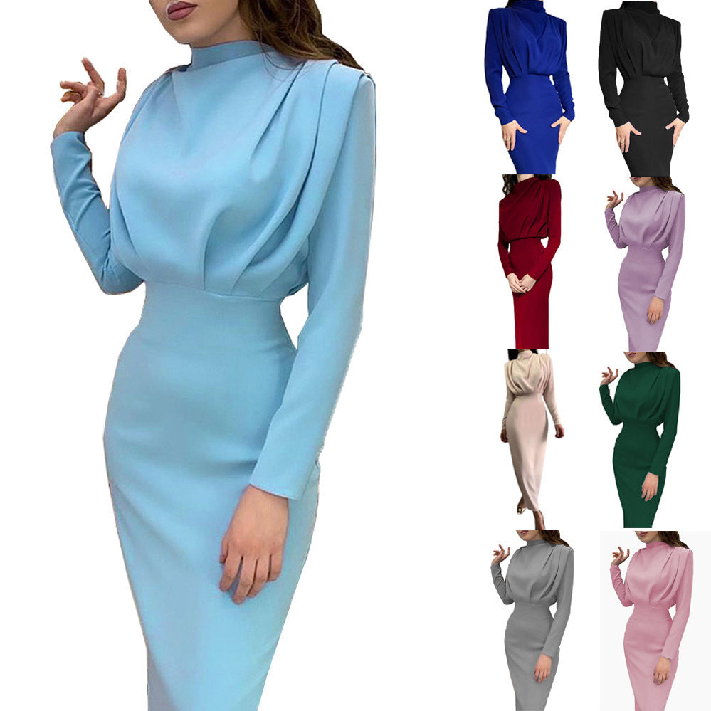 Damer Elegant och figurnära långärmad klänning med hög krage Mirla-Eva Jonsson