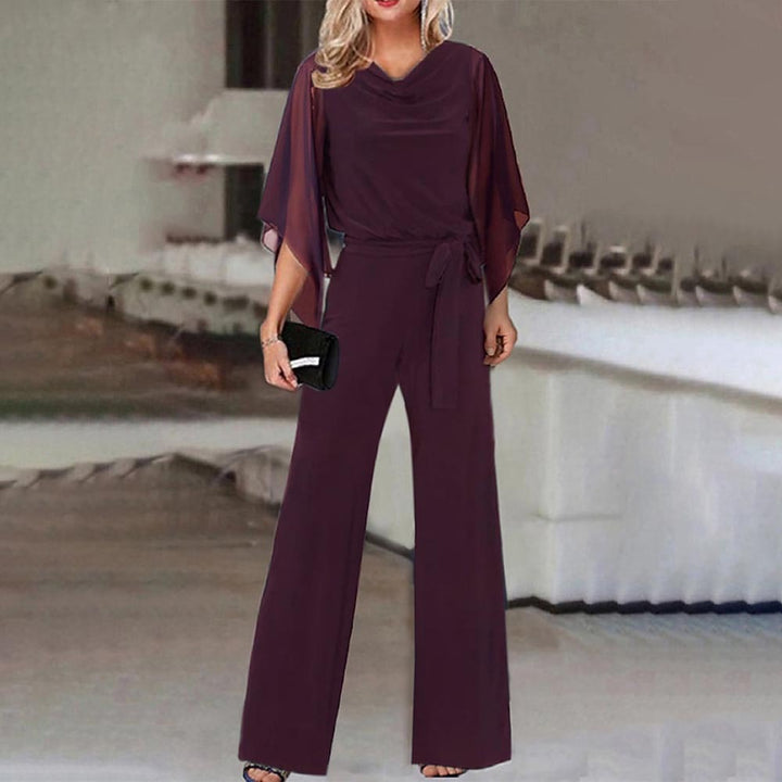 Damer Elegant och flödande jumpsuit med vida ben och midjejusterbart bälte Mirla-Eva Jonsson