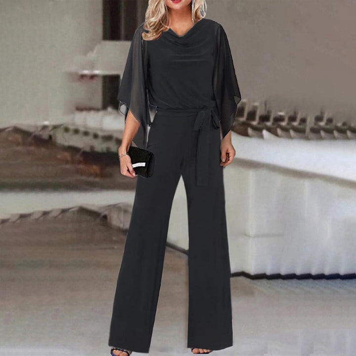 Damer Elegant och flödande jumpsuit med vida ben och midjejusterbart bälte Mirla-Eva Jonsson