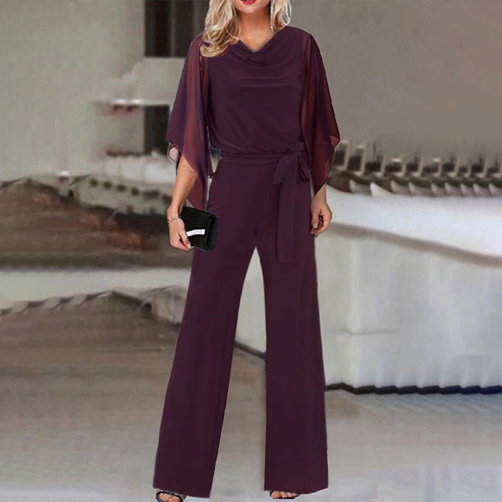 Damer Elegant och flödande jumpsuit med vida ben och midjejusterbart bälte Mirla-Eva Jonsson
