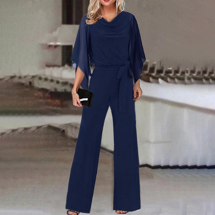 Damer Elegant och flödande jumpsuit med vida ben och midjejusterbart bälte Mirla-Eva Jonsson