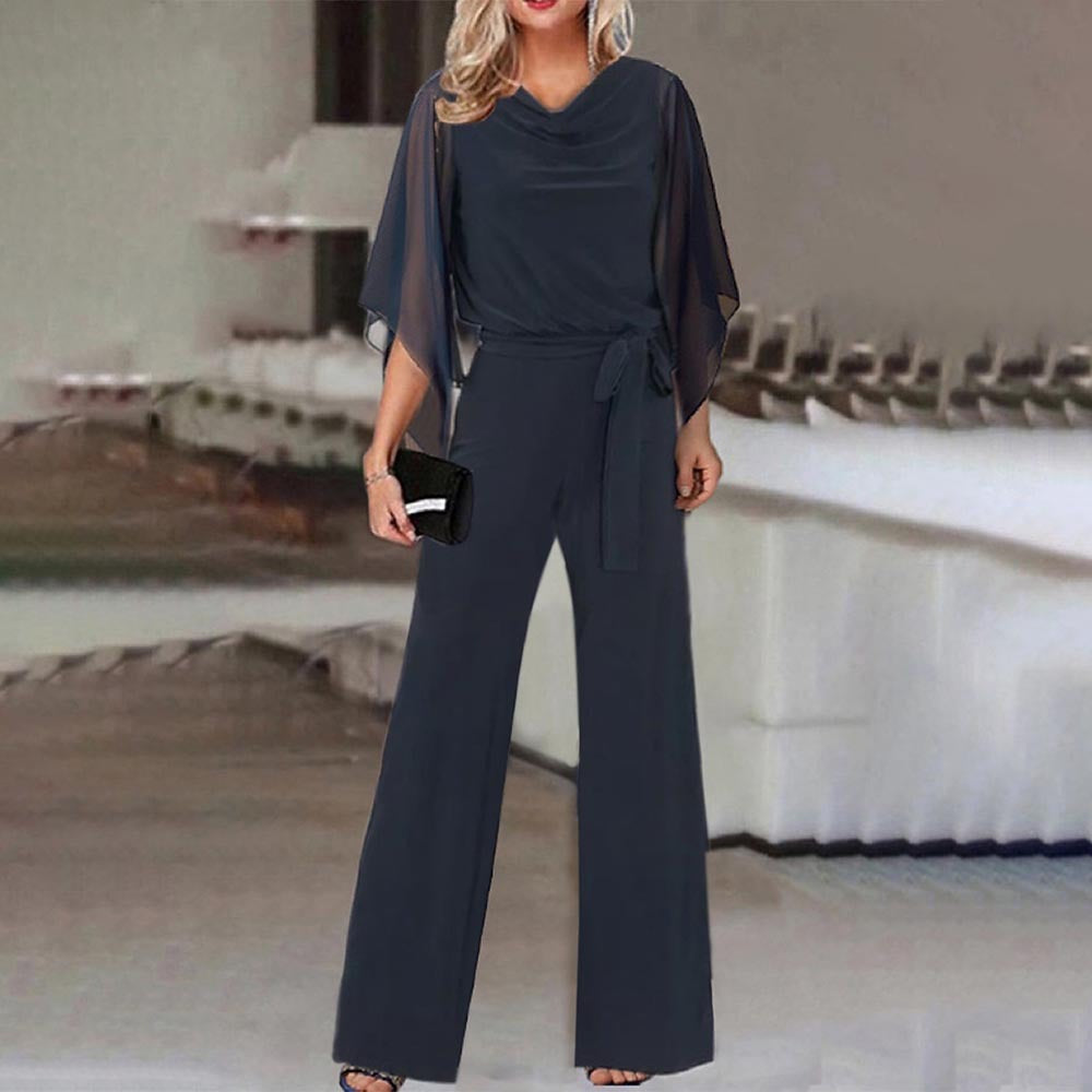 Damer Elegant och flödande jumpsuit med vida ben och midjejusterbart bälte Mirla-Eva Jonsson