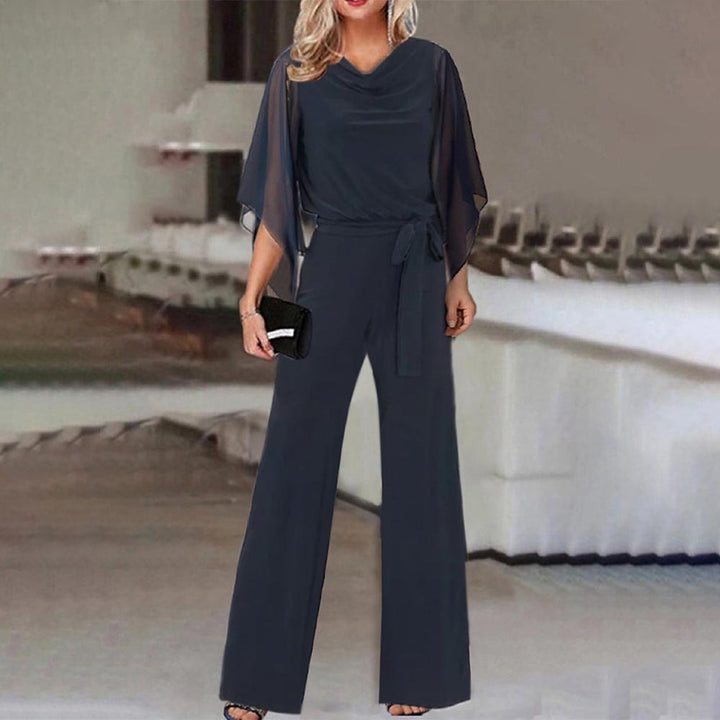 Damer Elegant och flödande jumpsuit med vida ben och midjejusterbart bälte Mirla-Eva Jonsson