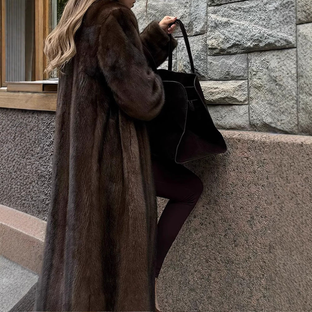 Damer Elegant och fluffig Lång kappa i konstpäls Mirla-Eva Jonsson