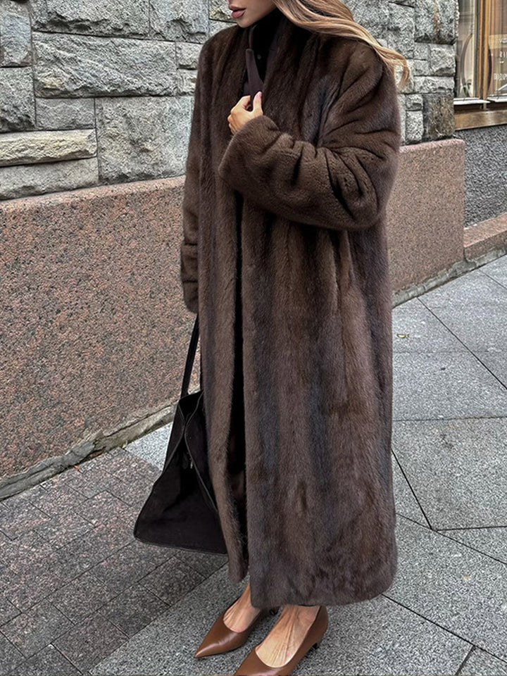 Damer Elegant och fluffig Lång kappa i konstpäls Mirla-Eva Jonsson