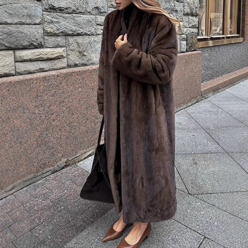 Damer Elegant och fluffig Lång kappa i konstpäls Mirla-Eva Jonsson