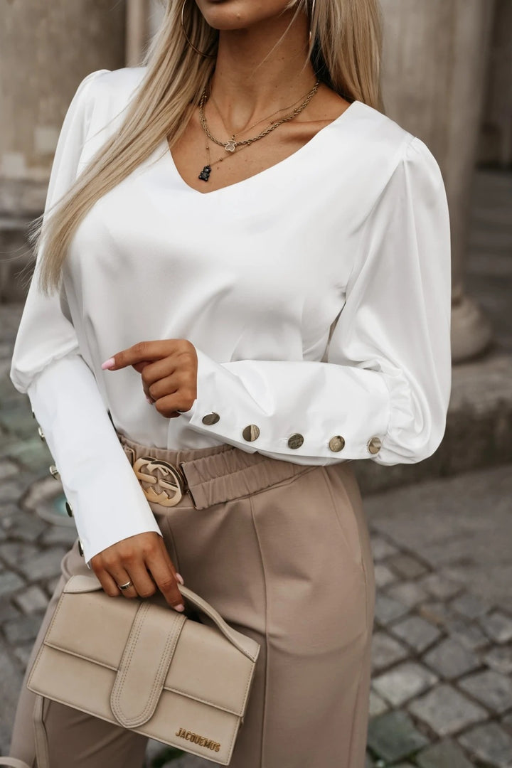 Damer Elegant och mångsidig blus med skimrande knapppdetaljer Mirla-Eva Jonsson