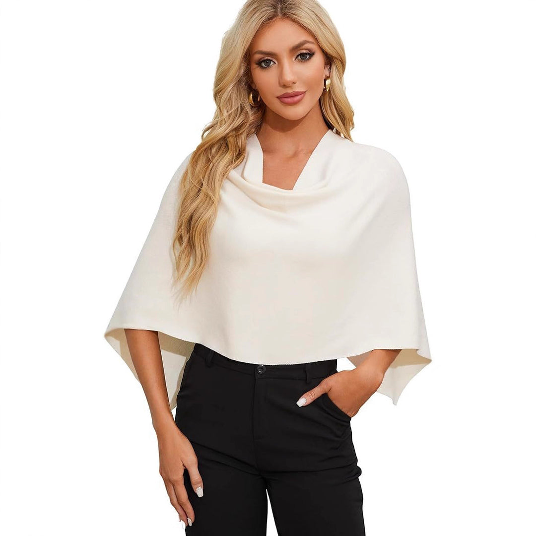 Damer Elegant och mångsidig stickad poncho Mirla-Eva Jonsson