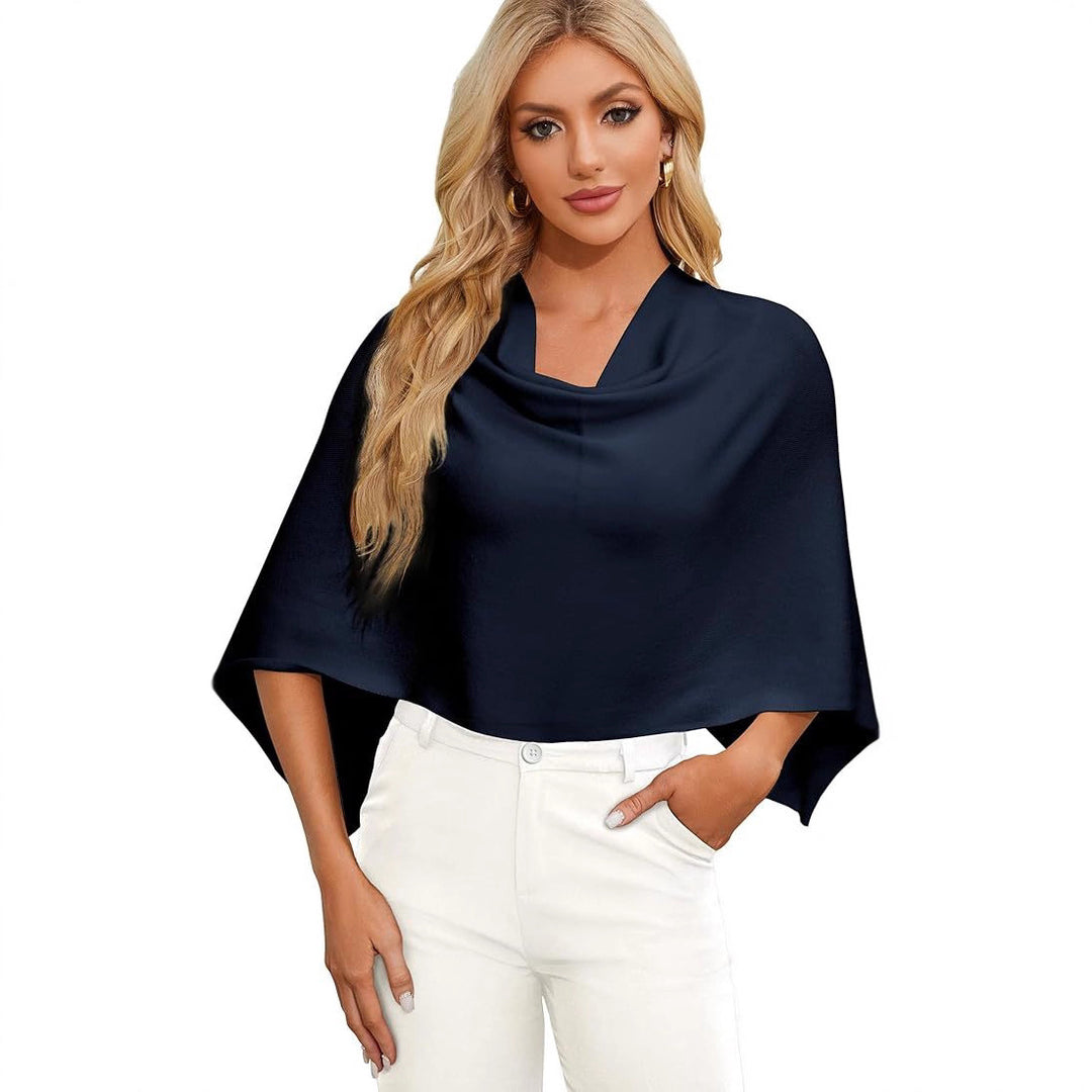 Damer Elegant och mångsidig stickad poncho Mirla-Eva Jonsson