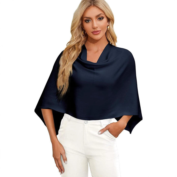 Damer Elegant och mångsidig stickad poncho Mirla-Eva Jonsson