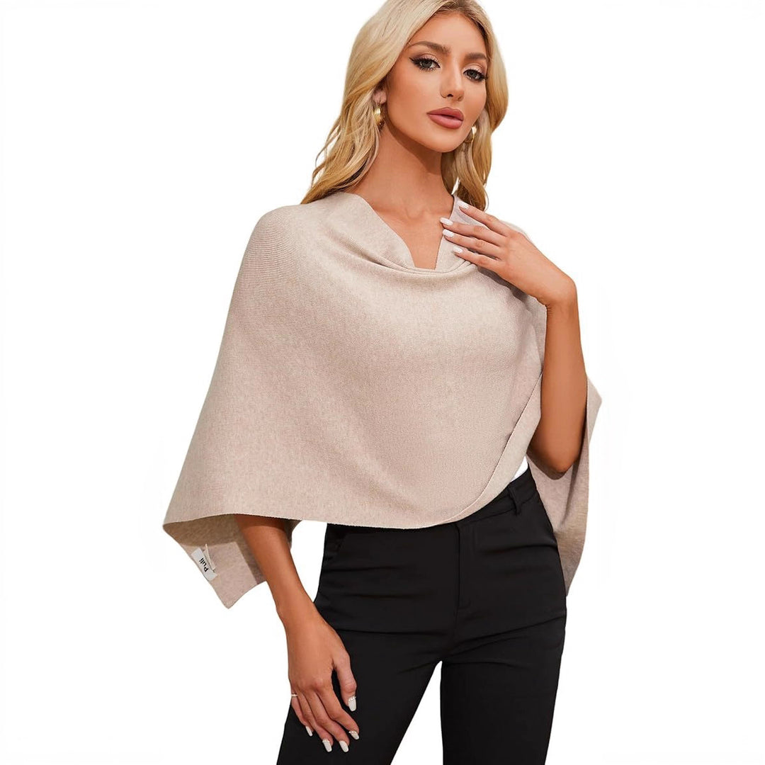 Damer Elegant och mångsidig stickad poncho Mirla-Eva Jonsson