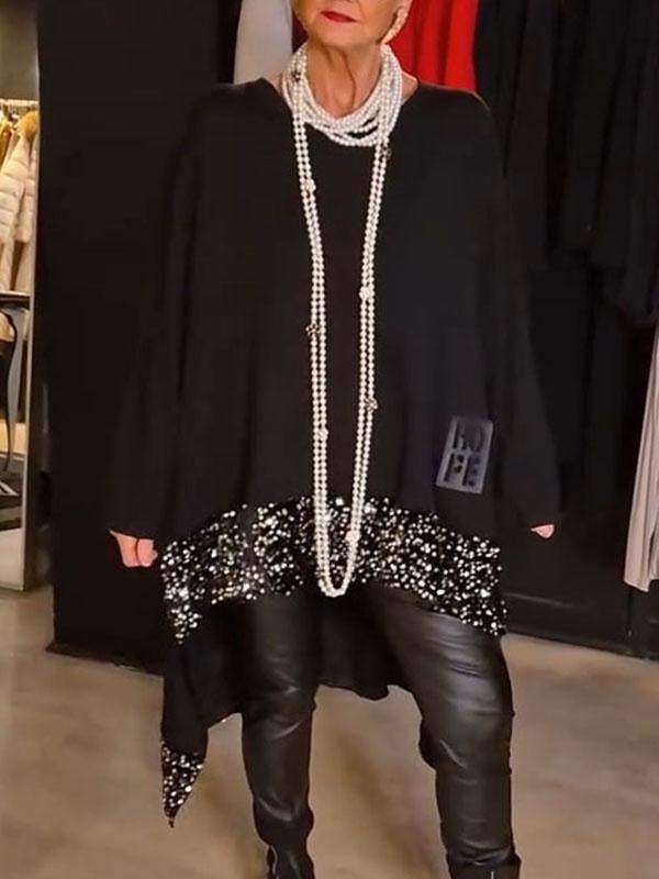 Damer Elegant och snygg stickad tröja med asymmetrisk fåll Mirla-Eva Jonsson