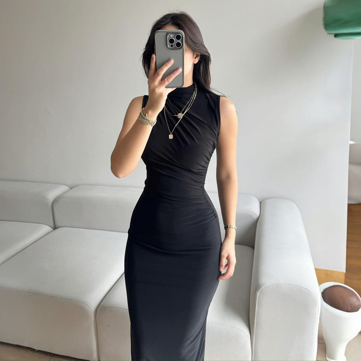 Damer Elegant omlottklänning med figursydd passform och hög slits Mirla-Eva Jonsson