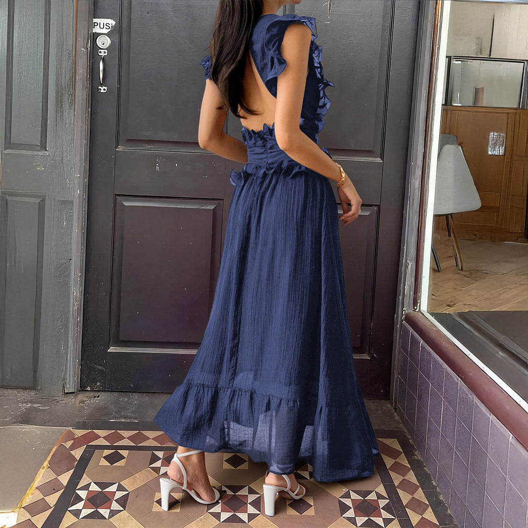 Damer Elegant omlottklänning med volangdetaljer och figurformad silhuett Mirla-Eva Jonsson