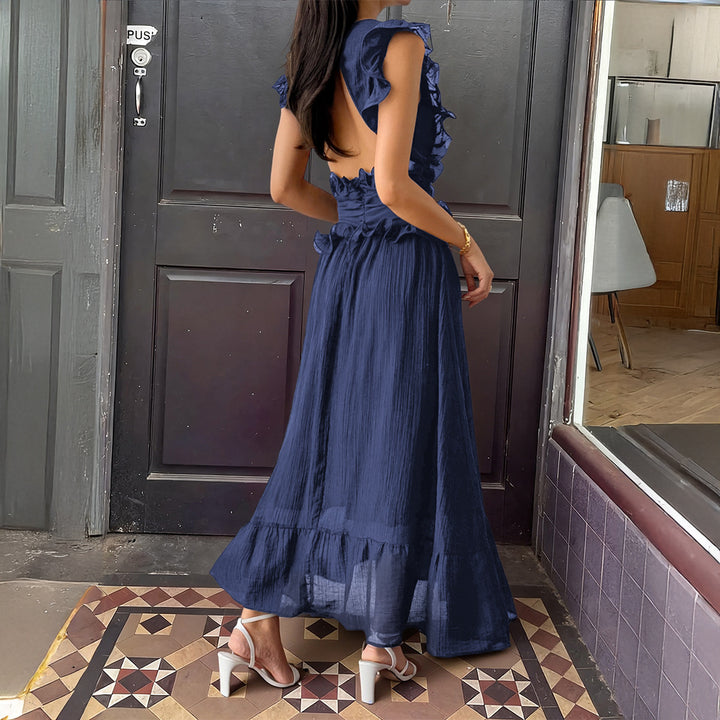 Damer Elegant omlottklänning med volangdetaljer och figurformad silhuett Mirla-Eva Jonsson