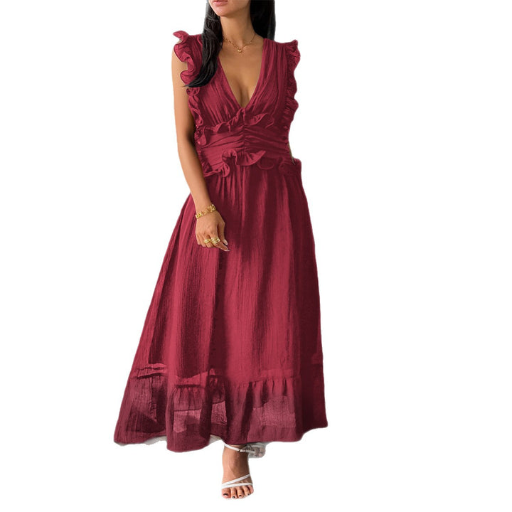 Damer Elegant omlottklänning med volangdetaljer och figurformad silhuett Mirla-Eva Jonsson