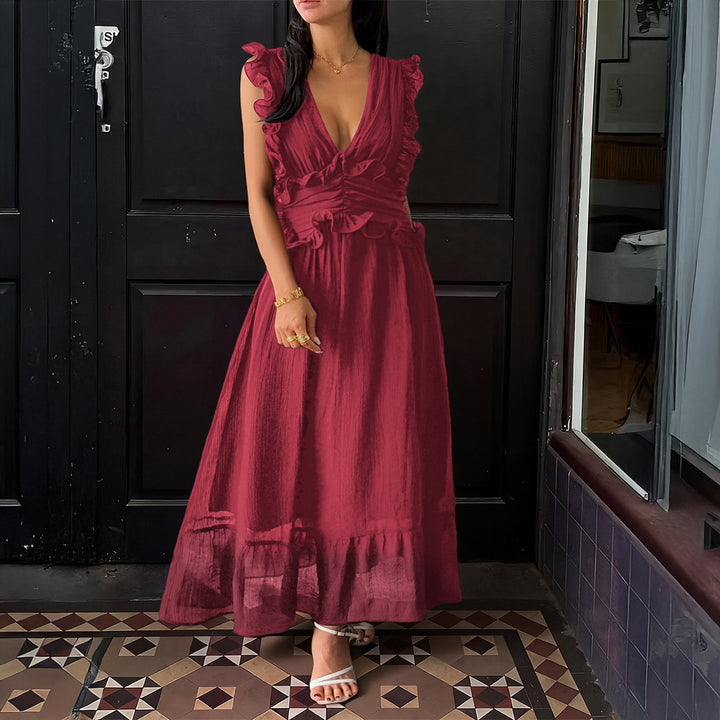 Damer Elegant omlottklänning med volangdetaljer och figurformad silhuett Mirla-Eva Jonsson