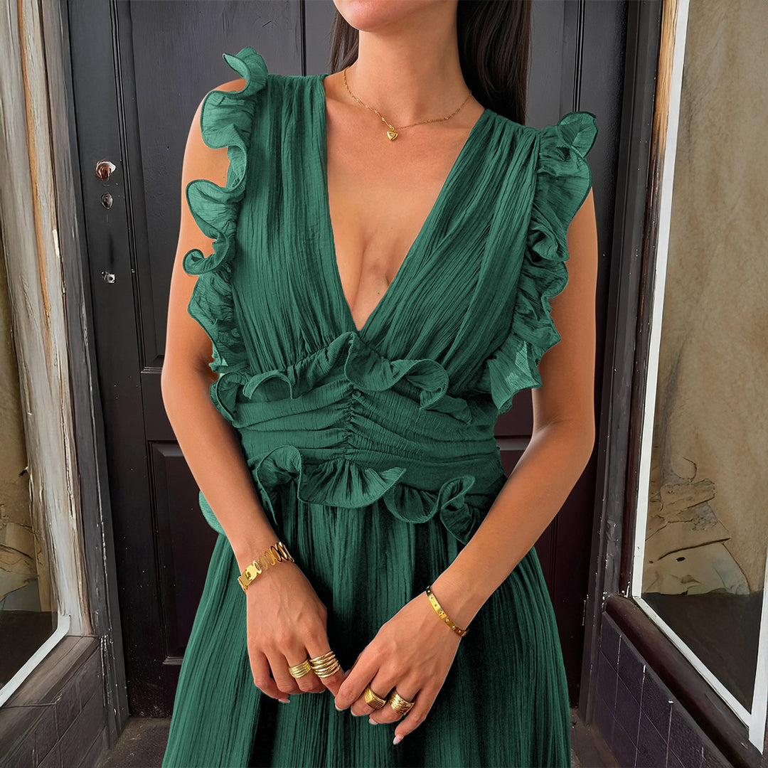 Damer Elegant omlottklänning med volangdetaljer och figurformad silhuett Mirla-Eva Jonsson