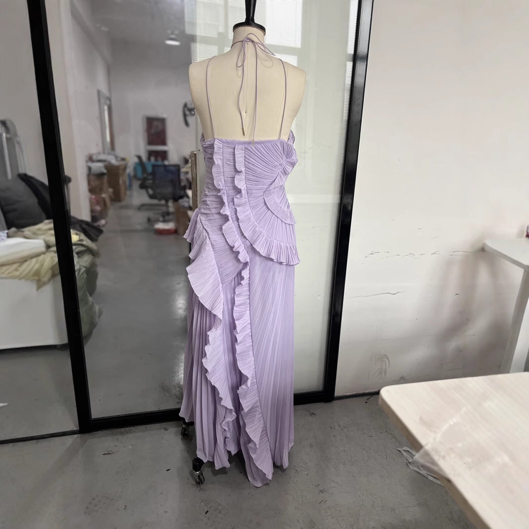 Damer Elegant plisserat Maxiklänning med asymmetrisk design Mirla-Eva Jonsson