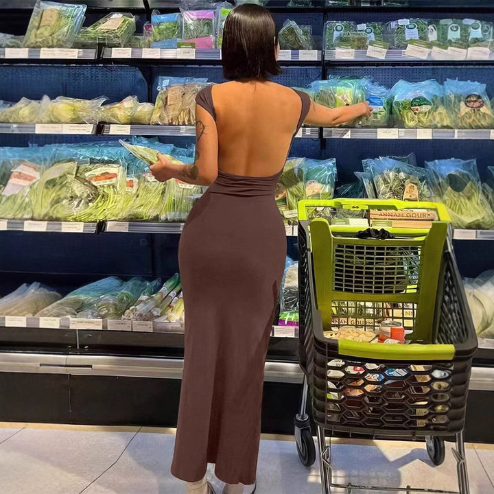 Damer Elegant rygglös maxiklänning med smal passform och fina axelband Eva Jonsson-Eva Jonsson