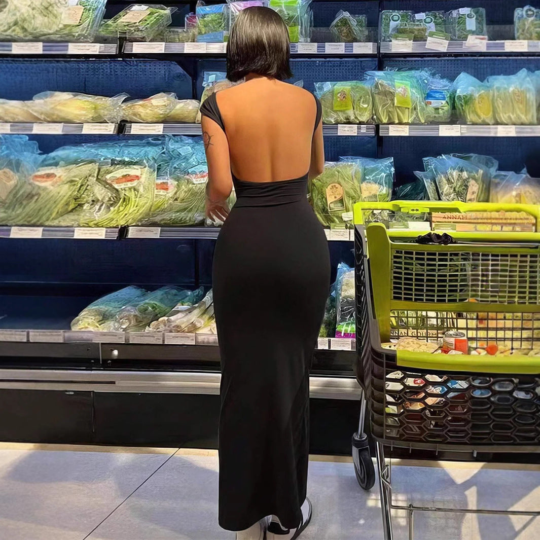 Damer Elegant rygglös maxiklänning med smal passform och fina axelband Eva Jonsson-Eva Jonsson