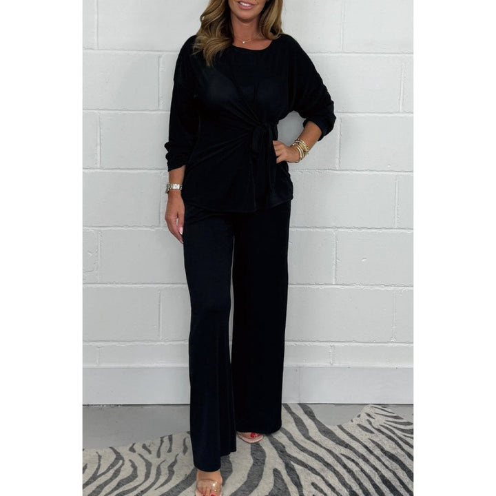 Damer Elegant set av mjukt flödande material med figursydd topp och vidare byxor Eva Jonsson-Eva Jonsson
