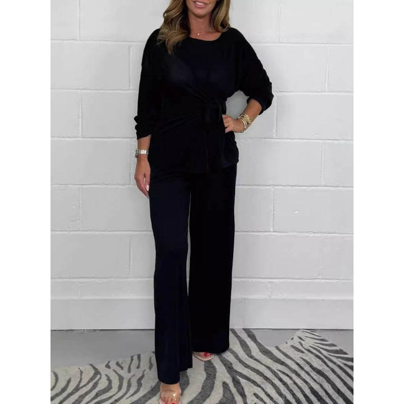 Damer Elegant set av mjukt flödande material med figursydd topp och vidare byxor Eva Jonsson-Eva Jonsson
