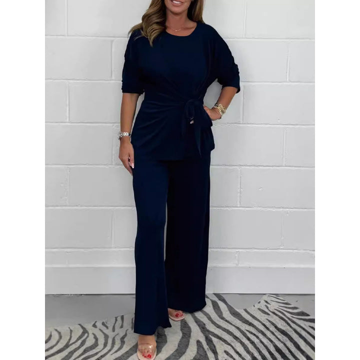 Damer Elegant set av mjukt flödande material med figursydd topp och vidare byxor Eva Jonsson-Eva Jonsson