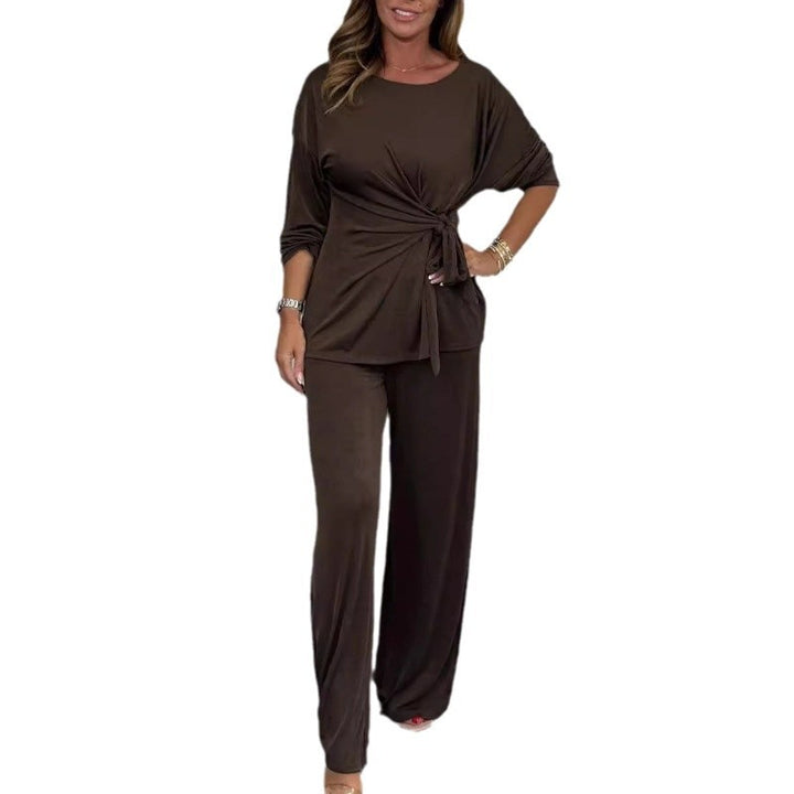 Damer Elegant set av mjukt flödande material med figursydd topp och vidare byxor Eva Jonsson-Eva Jonsson