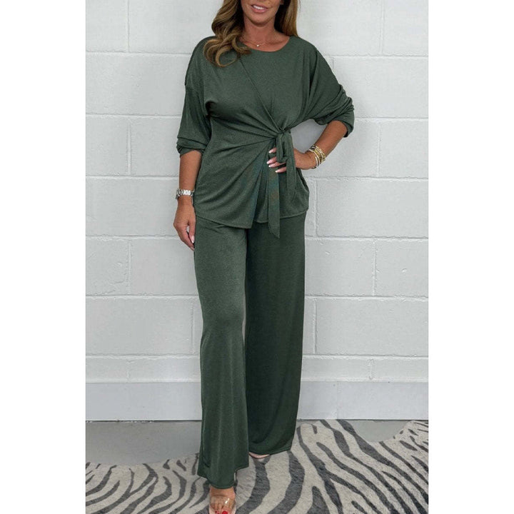 Damer Elegant set av mjukt flödande material med figursydd topp och vidare byxor Eva Jonsson-Eva Jonsson