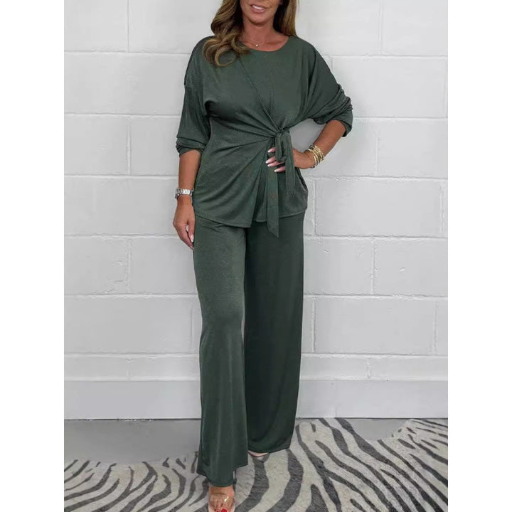 Damer Elegant set av mjukt flödande material med figursydd topp och vidare byxor Eva Jonsson-Eva Jonsson