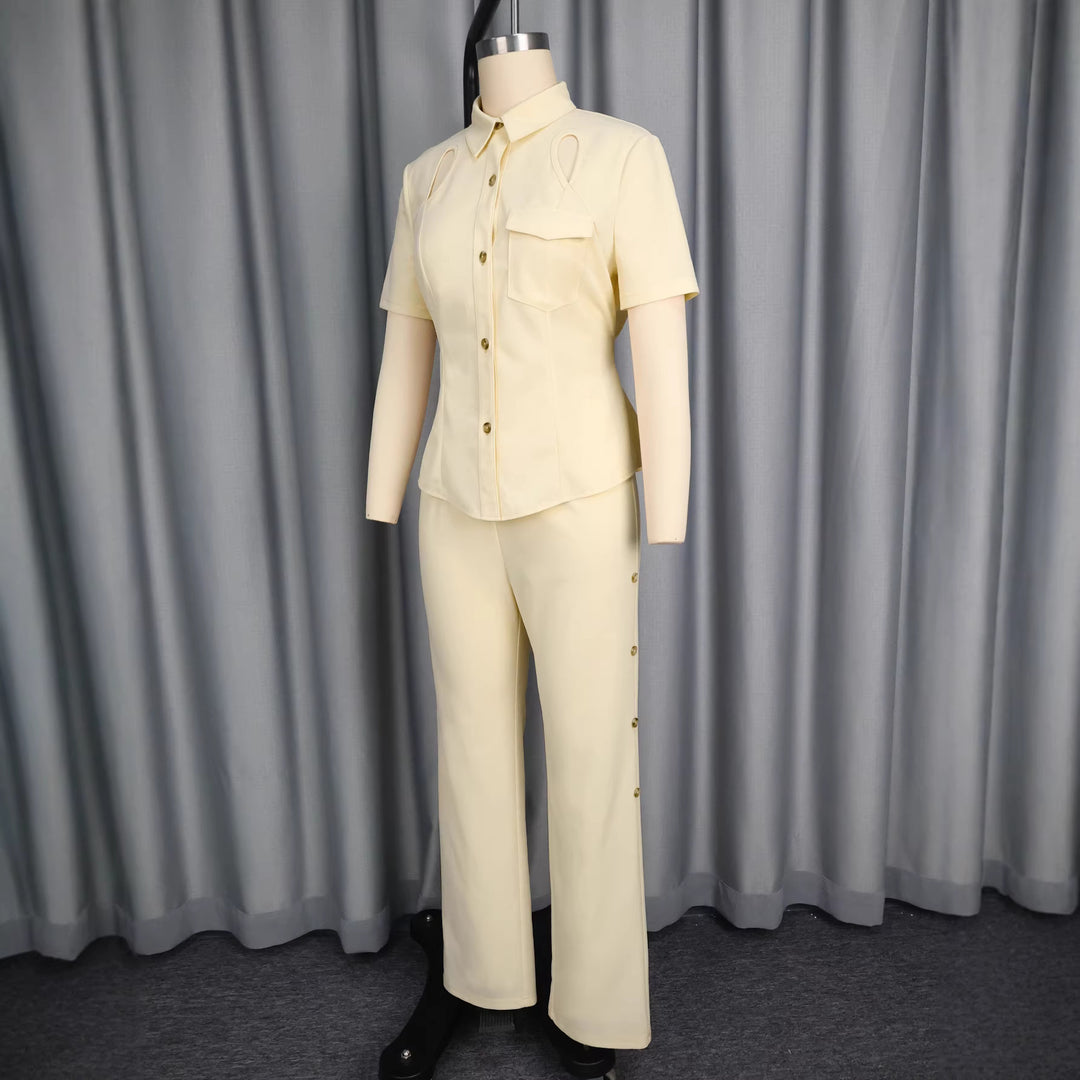 Damer Elegant set med figurnära överdel med cut-outs och smalt skurna byxor Mirla-Eva Jonsson