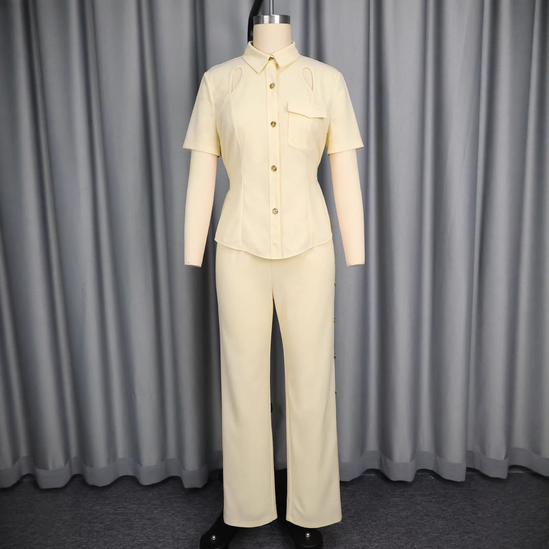Damer Elegant set med figurnära överdel med cut-outs och smalt skurna byxor Mirla-Eva Jonsson