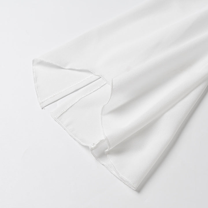 Damer Elegant skuren blus med volangdetaljer Mirla-Eva Jonsson