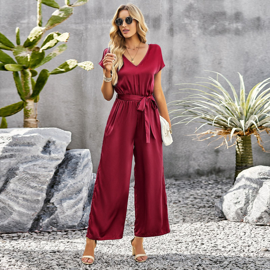 Damer Elegant skuren jumpsuit med vida ben och midjebälten Mirla-Eva Jonsson