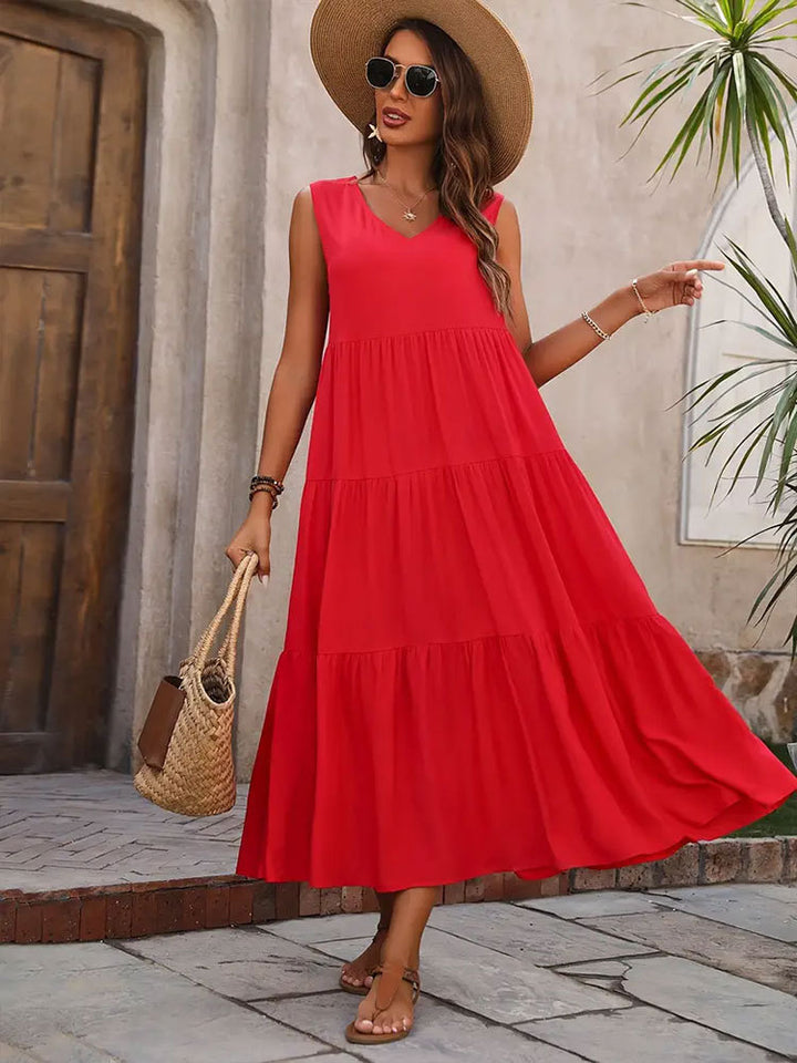 Damer Elegant sommar-maxiklänning med voluminös kjol och V-hals Mirla-Eva Jonsson
