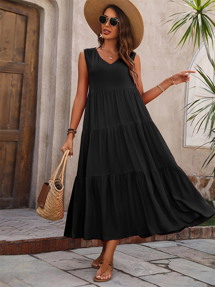 Damer Elegant sommar-maxiklänning med voluminös kjol och V-hals Mirla-Eva Jonsson