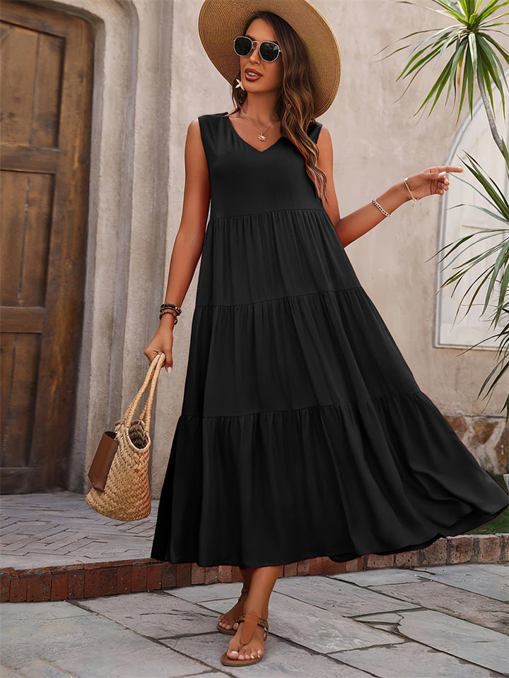 Damer Elegant sommar-maxiklänning med voluminös kjol och V-hals Mirla-Eva Jonsson