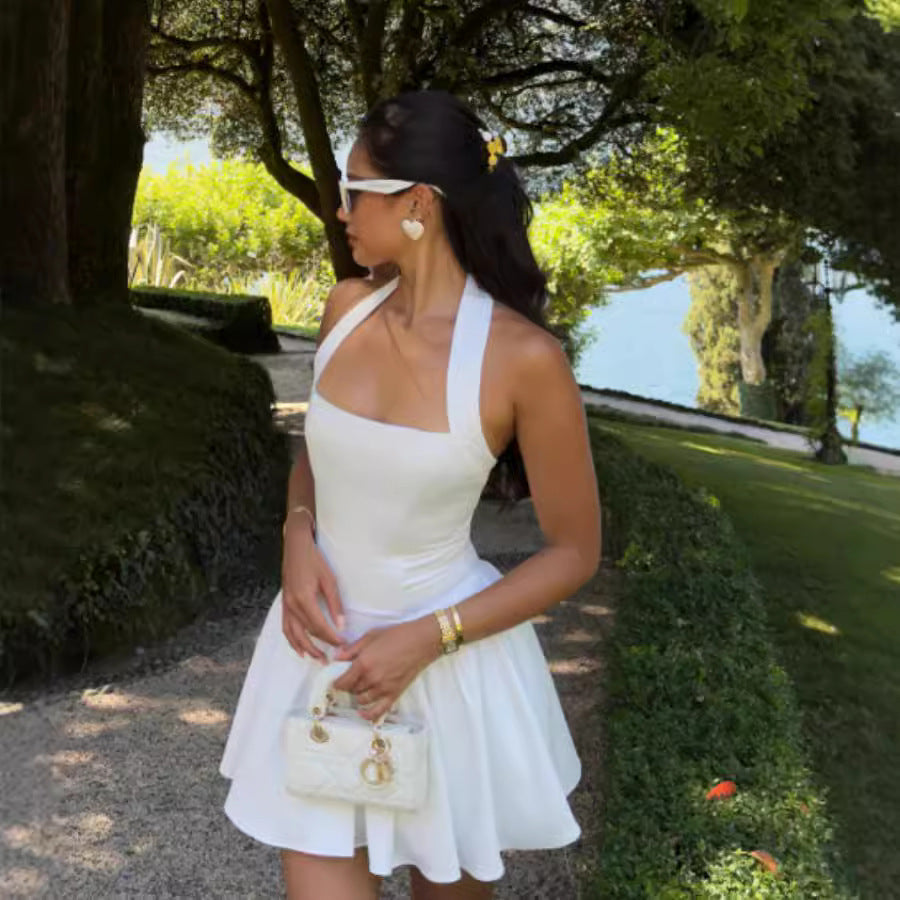 Damer Elegant sommarklänning med axelbandslös design och svängande kjol Eva Jonsson-Eva Jonsson