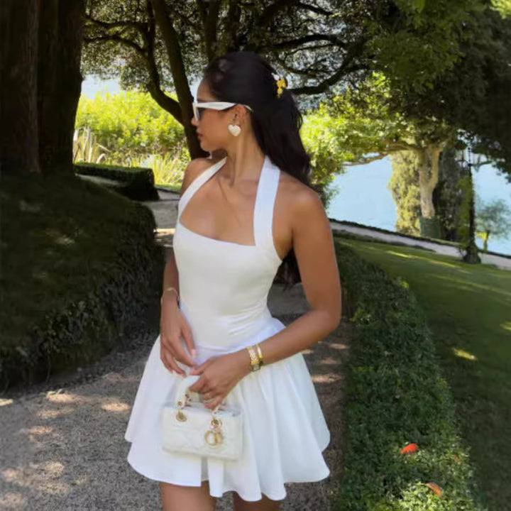 Damer Elegant sommarklänning med axelbandslös design och svängande kjol Eva Jonsson-Eva Jonsson