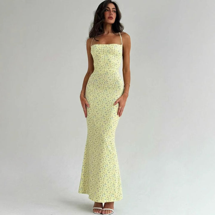 Damer Elegant sommarklänning med ömtåligt blommönster och flödande snitt Mirla-Eva Jonsson