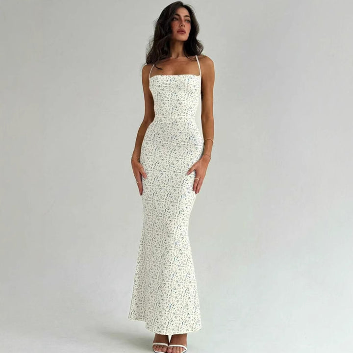 Damer Elegant sommarklänning med ömtåligt blommönster och flödande snitt Mirla-Eva Jonsson
