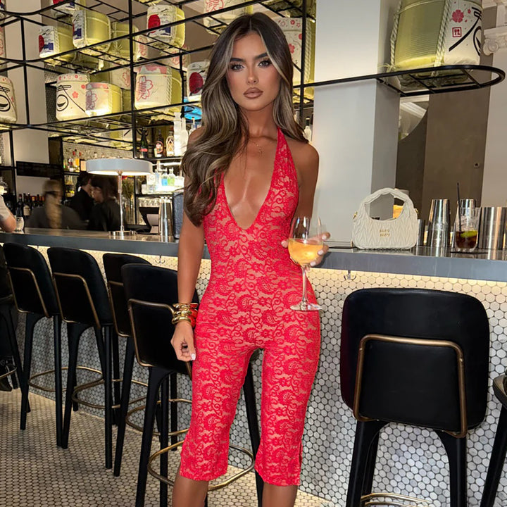 Damer Elegant spets jumpsuit med djup V-ringning och sidofickor Mirla-Eva Jonsson