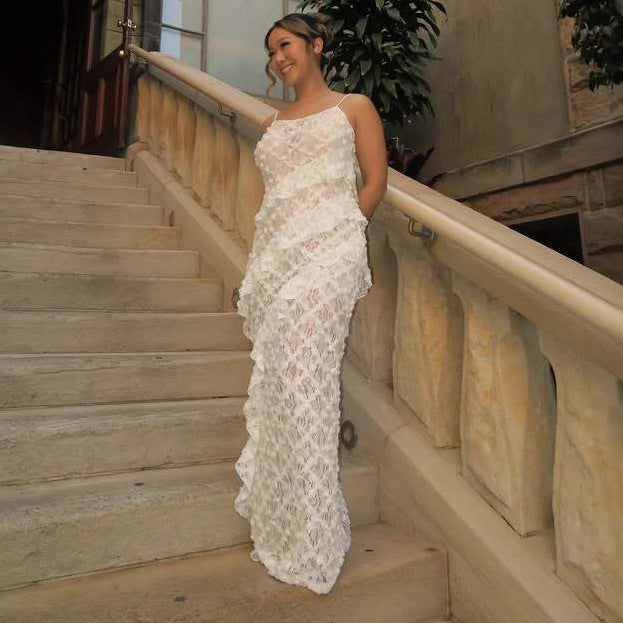 Damer Elegant spets maxiklänning med asymmetrisk drapering Mirla-Eva Jonsson